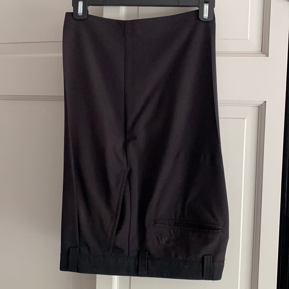 Adidas black shorts.